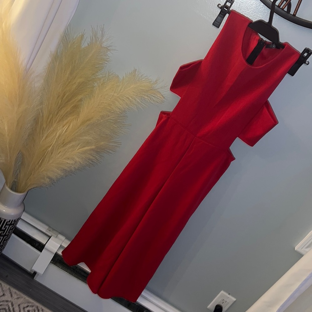 Misguided red cut out cullotte jumpsuit. Worn once size 8.